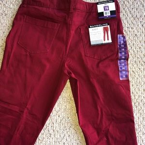 Bandolino burgundy straight leg jeans sit at natural waist.